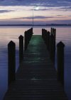 Wooden dock at dawn with scenery of Manatee County, Florida, USA — Stock Photo