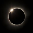 Total lunar eclipse on black background — Stock Photo