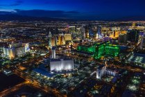 Aerial view of Las Vegas cityscape lit up at night, Las Vegas, Nevada, United States — Stock Photo