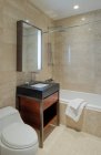 Sink, toilet and bath of modern bathroom — Stock Photo