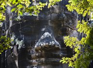 Cara de piedra tallada, Angkor, Camboya - foto de stock