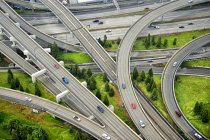 Aerial view of interstate change overpasses with cars — Stock Photo