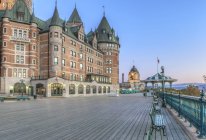 Chateau Frontenac castle on city street at dawn, Quebec, Canada — Stock Photo