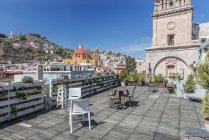 Cafe on terrace with cityscape of Guanajuato, Mexico — Stock Photo