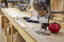 Wood, workbenches and tools in workshop — Stock Photo
