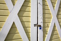 Barn doors closed with lock, full frame — Stock Photo