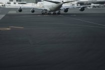 Detail of plane on airport tarmac in Shanghai, China, Asia — Stock Photo