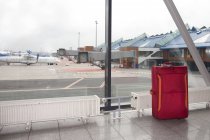 Rolling luggage in airport concourse of Tallinn airport, Tallinn, Estonia, Europe — Stock Photo