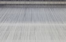Threads in a Industrial Loom, Nikologory, Rusia - foto de stock