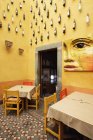 Ornate restaurant interior with wine bottles decoration, San Miguel de Allende, Guanajuato, Mexico — Stock Photo