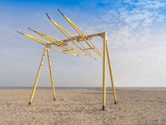 Swing set on sandy beach in Estonia — Stock Photo