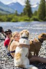 Teenage girl embracing dog in Crested Butte, Colorado, USA. — Stock Photo