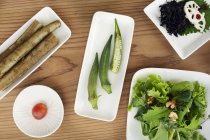 High angle close-up of a selection of vegetarian Japanese dishes in a cafe. — Stock Photo