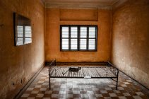 Interior view of prison cell at the Tuol Sleng Genocide Museum, Phnom Penh, Cambodia. — Stock Photo