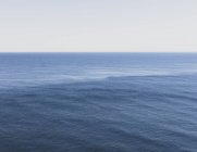 View of expansive ocean, horizon and sky at dusk, northern Oregon coast — Stock Photo