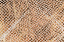 Dettaglio della rete da pesca commerciale che copre la tela cerata — Foto stock
