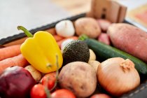 Box of fresh organic vegetables, close-up view — Stock Photo