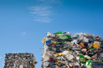 Commercial waste management, bales of recycling materials, plastics stacked up. — Stock Photo