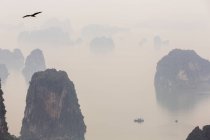 Aerial view over misty Ha Long Bay, North Vietnam — Stock Photo