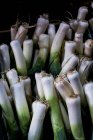 High angle close up of bunches of freshly picked leeks. — Stock Photo