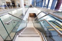Empty airport interior, concourse and stairs and escalators — Stock Photo