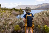 Young boy looking at pond, Stanford Valley Guest Farm, Stanford, Western Cape, South Africa. — Stock Photo