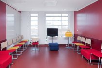Corridor and waiting areas of a modern hospital with seating Yellow bag. — Stock Photo