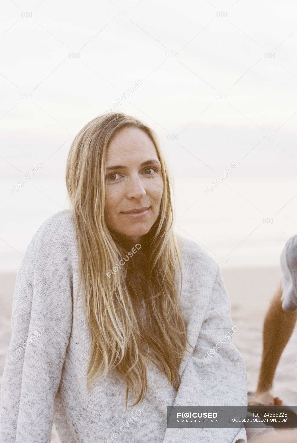 Woman Sitting On A Sandy Beach Long Hair Casual Clothing