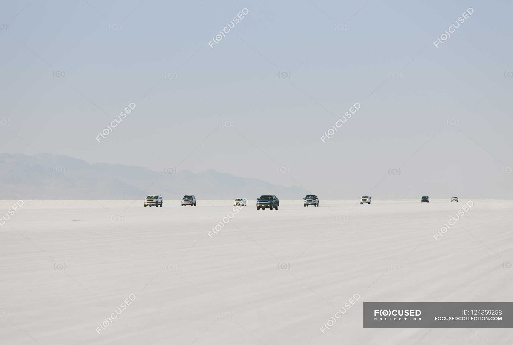 Cars driving on Bonneville — salt flat, tooele county - Stock Photo ...