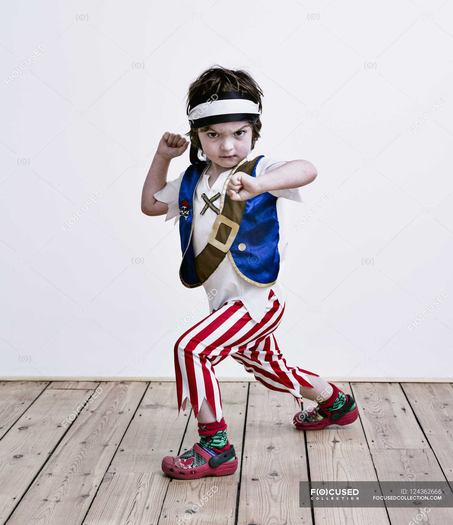 Boy in fancy dress costume — standing, indoors - Stock Photo | #124362666