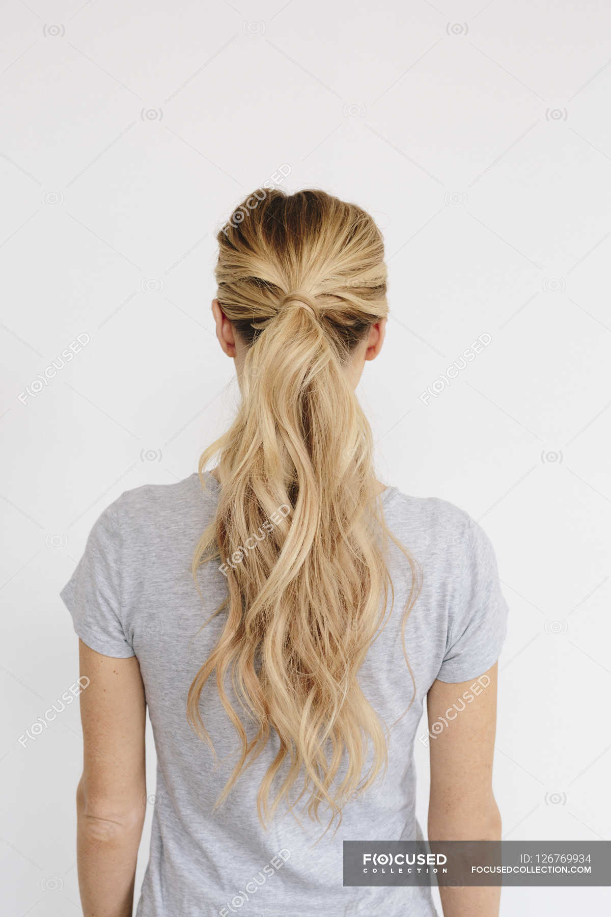 Woman With Blond Hair Tied In Ponytail Vertical 1 Person Stock  Woman With Blond Hair Tied In Ponytail Vertical 1 Person Stock
