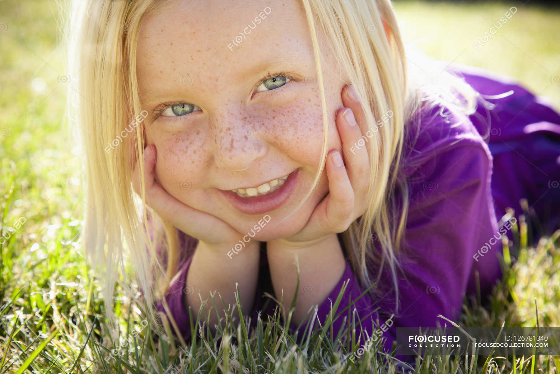 young-girl-lying-on-the-grass-photography-vitality-stock-photo