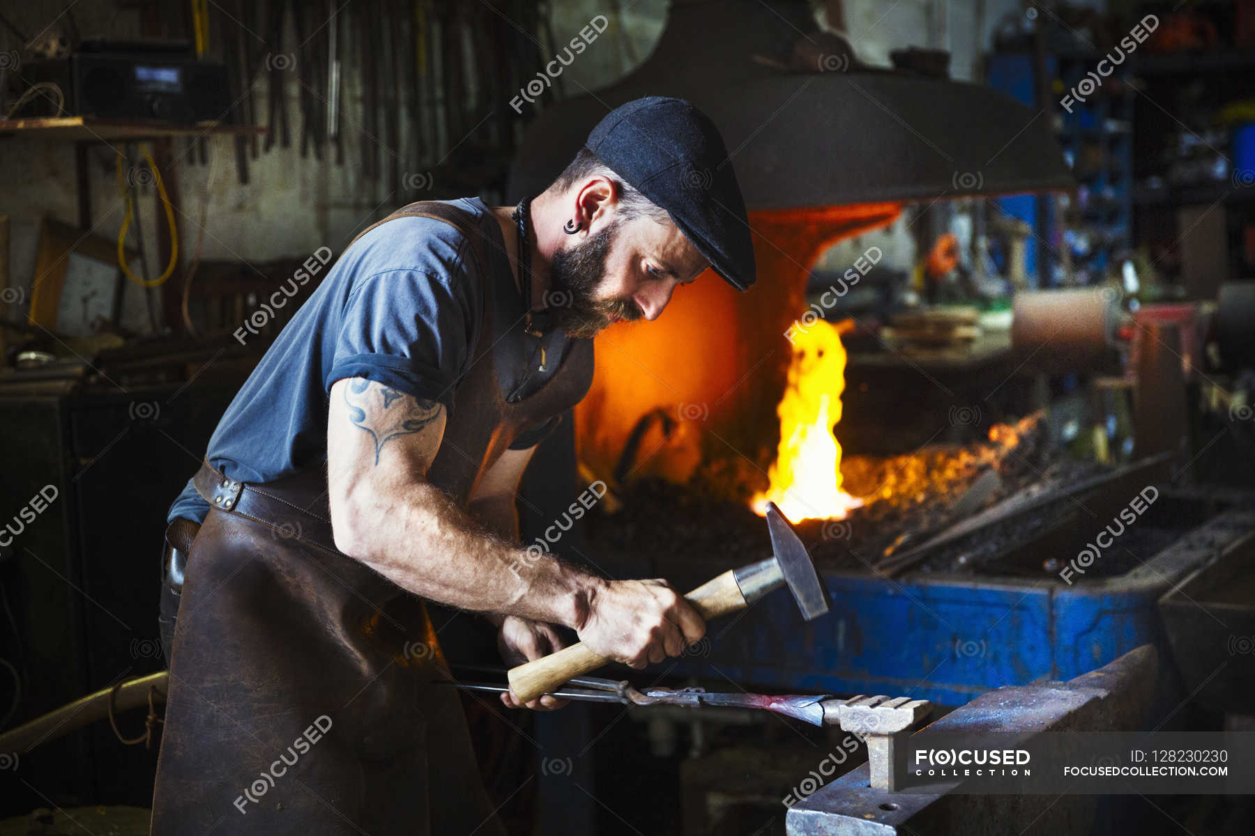 Blacksmith uses complex tools — Self Sufficient, 40 45 Years Stock