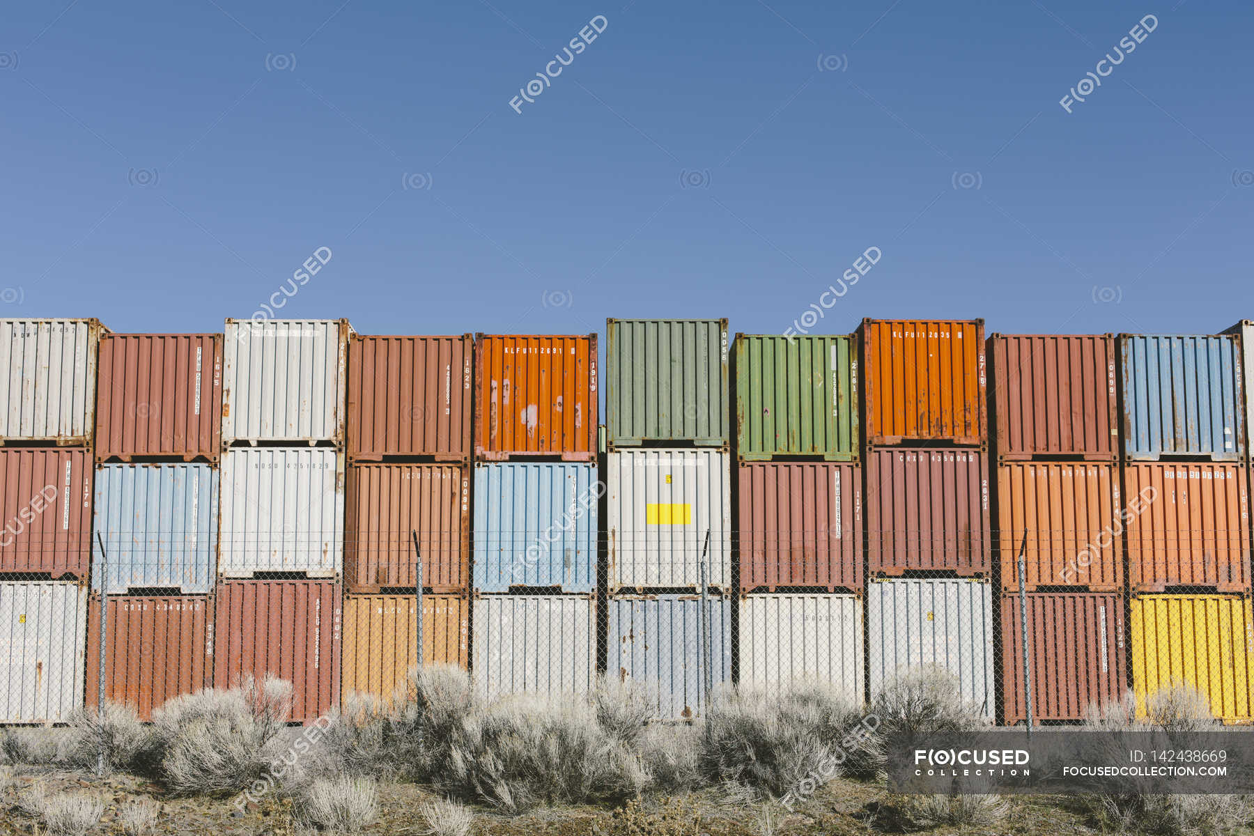 Stacks Of Colorful Shipping Containers Outdoors Rural Scene Stock Photo