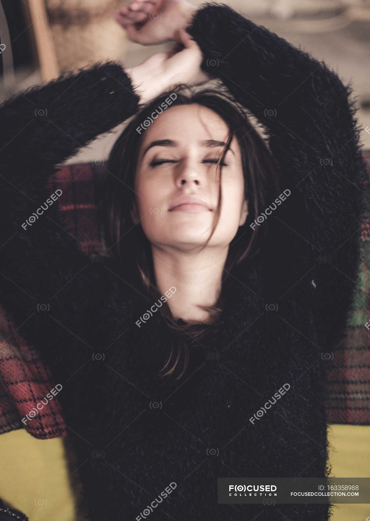 Woman wearing fluffy black jumper — energy, female - Stock Photo ...