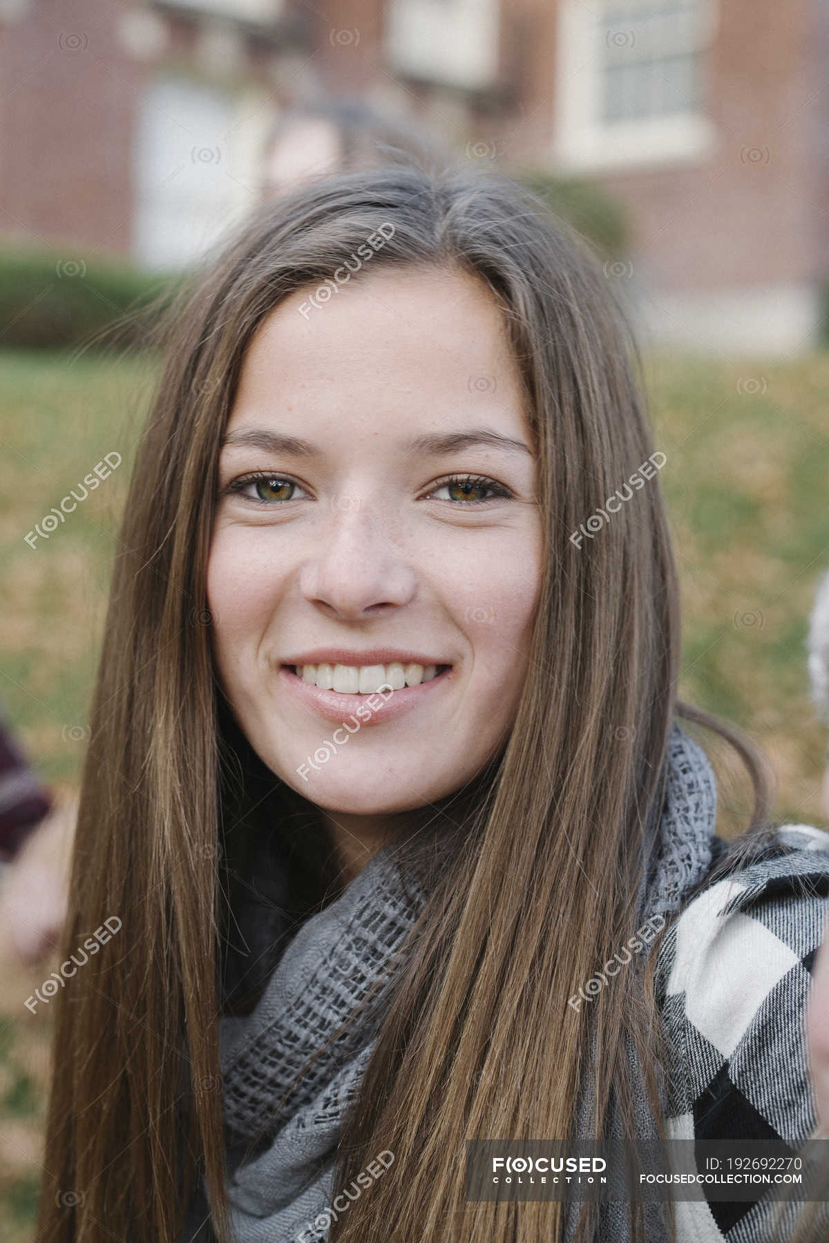 Portrait of long-haired teenage girl in scarf outdoors — Non Urban ...