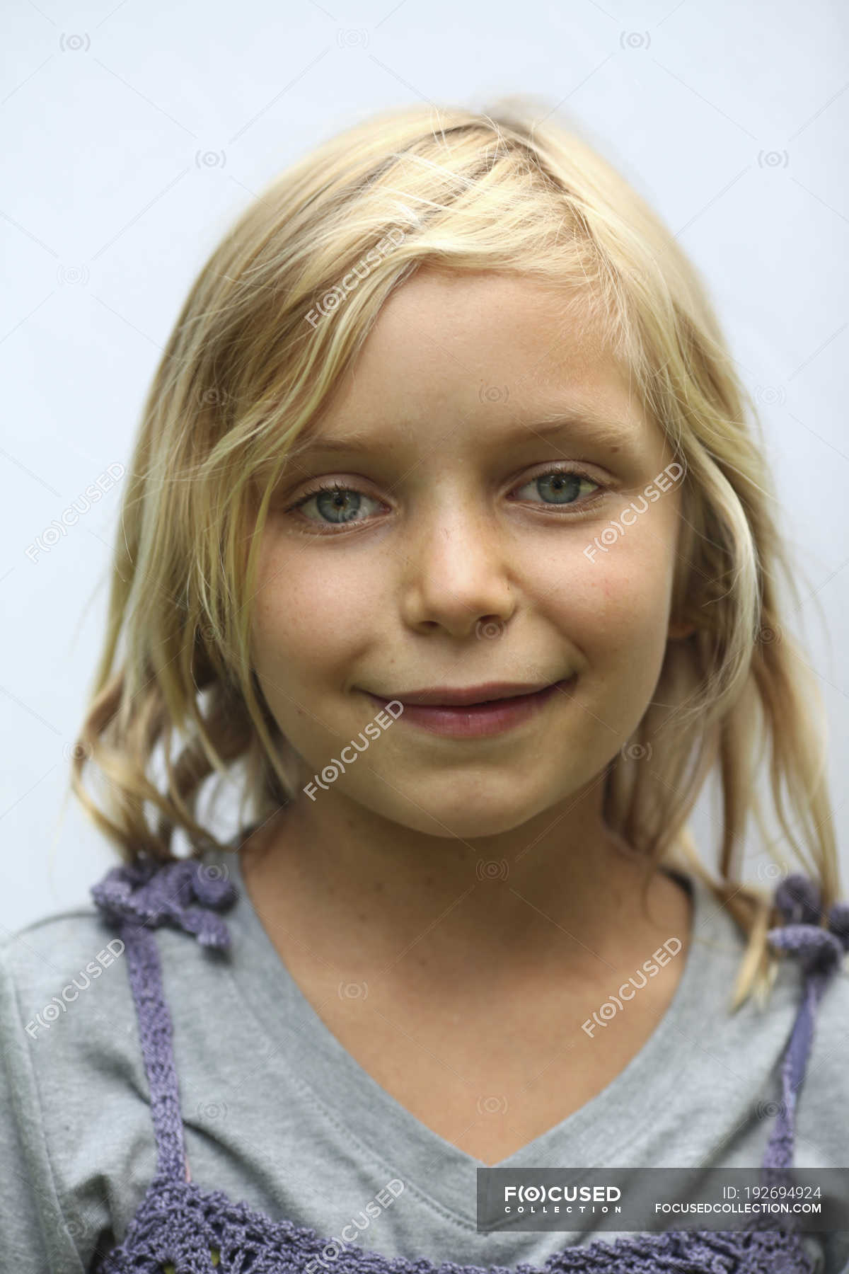 little girl with blonde hair and blue eyes