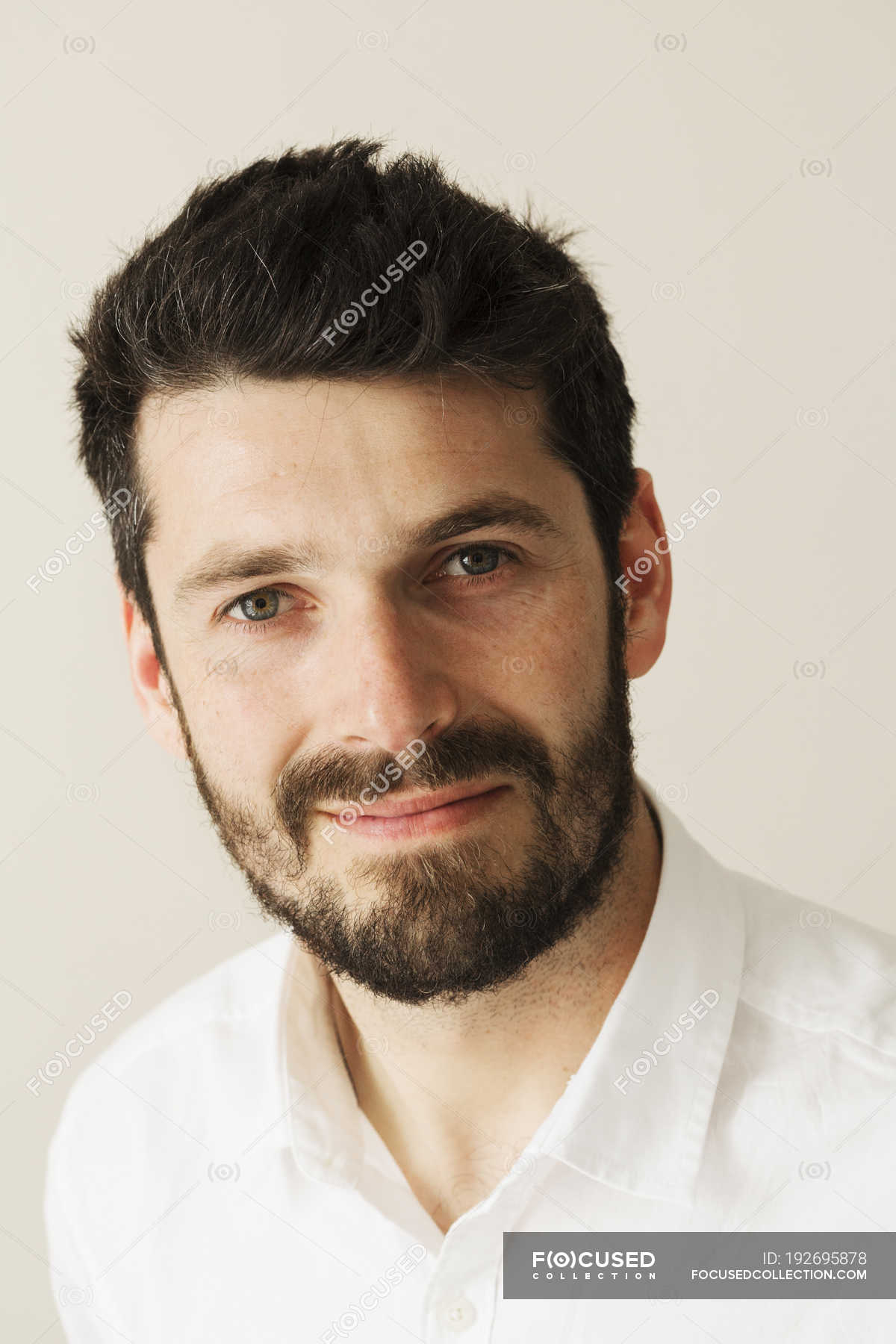 Portrait Of Bearded Man Smiling And Looking In Camera Brown Hair Short Hair Stock Photo