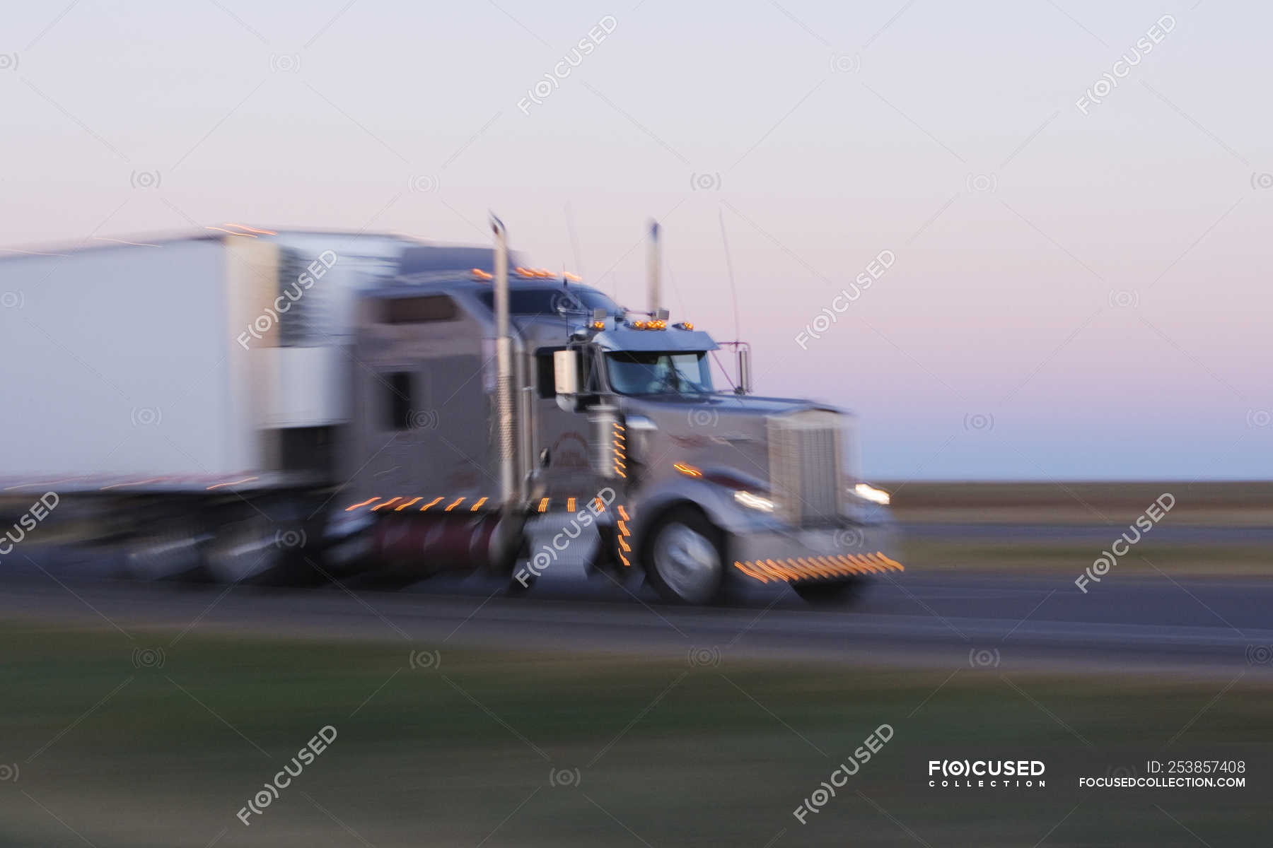 Truck riding on Texas highway 287 at sunrise, USA — outside, dusk ...