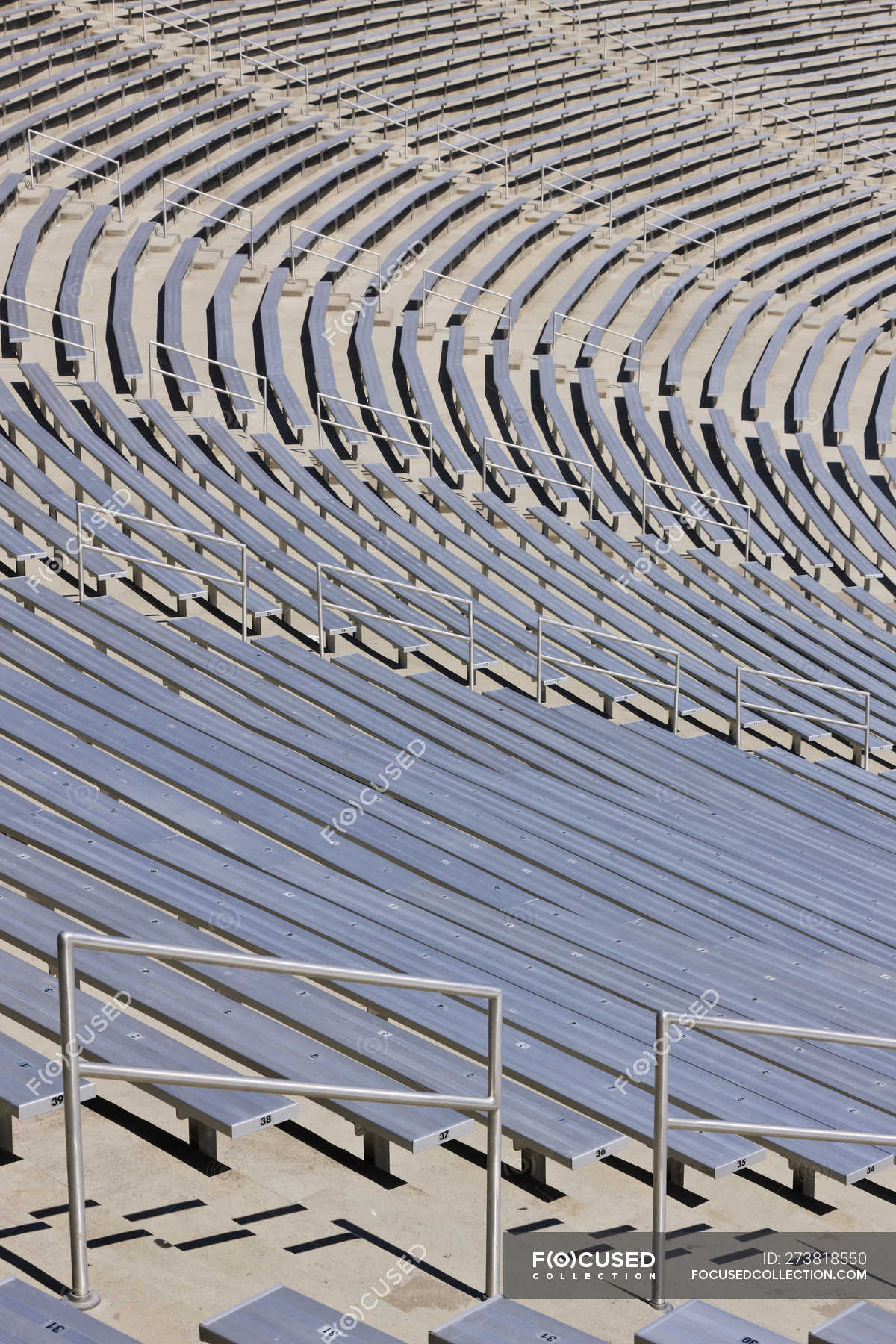 Full frame of sports stadium bleachers in Dallas, Texas, United States — seating, seats Stock