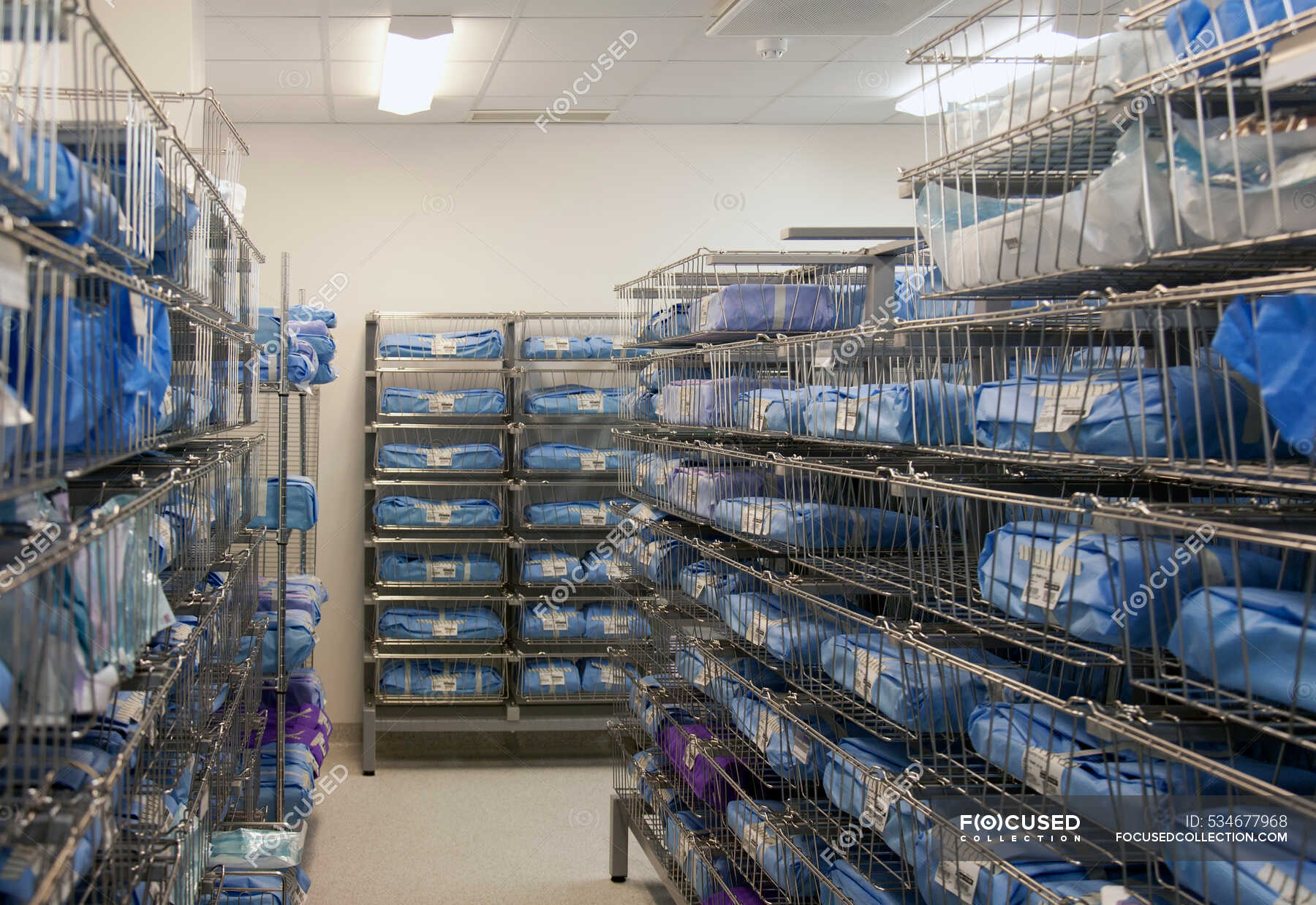 Storage room in a modern hospital, rows of sterile equipment packs in
