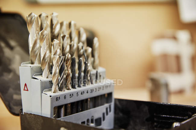 Drill bits arranged in a box neatly. — Stock Photo