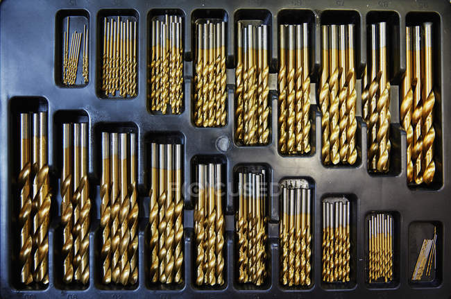 Drill bits arranged in size order — Stock Photo