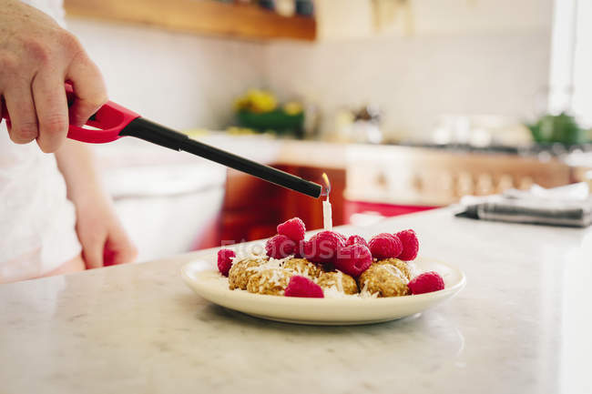 Plate with a dessert and fresh raspberries — Stock Photo