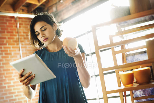 Young woman in a shop — Stock Photo