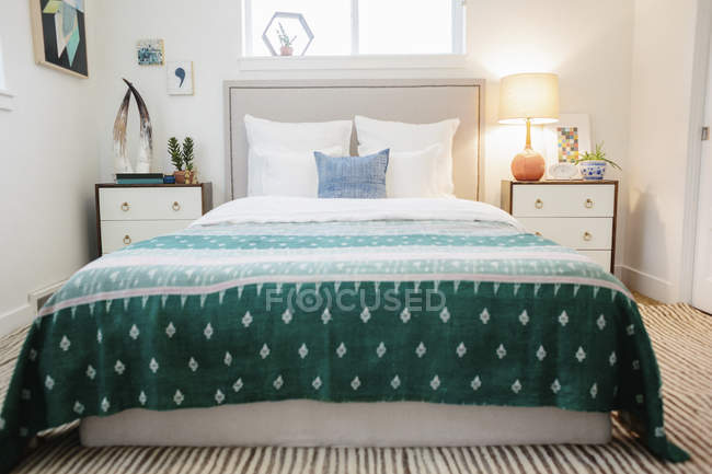 Bedroom in an apartment with a double bed — Stock Photo