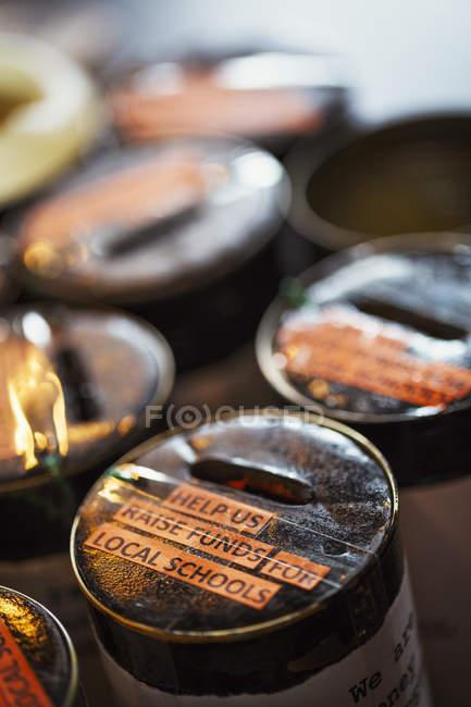 Charity collecting tins — Stock Photo