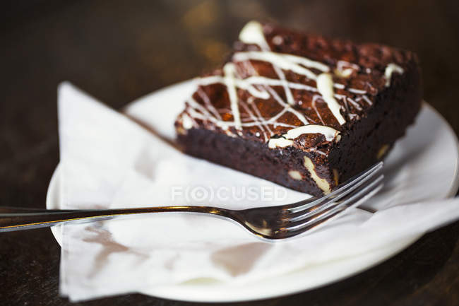 Iced chocolate brownie — Stock Photo