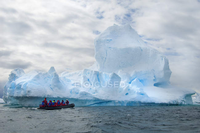 People in small inflatable rib boat — Stock Photo