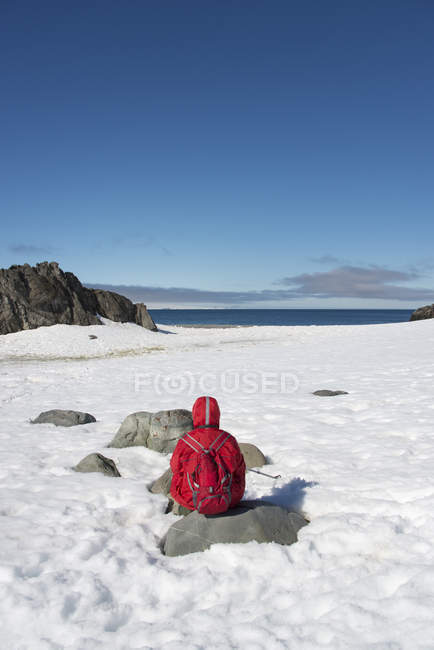 One person sitting taking in the landscape — Stock Photo
